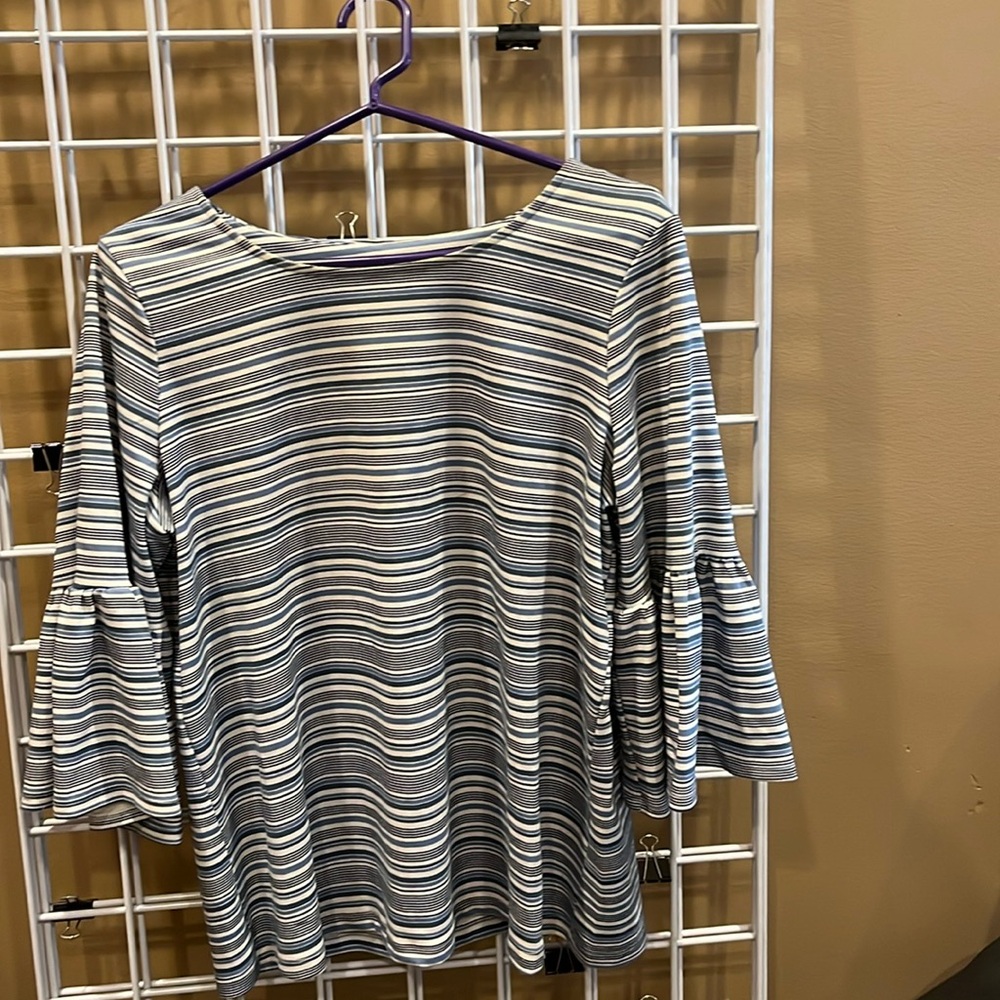Navy blue and white striped women’s top.
